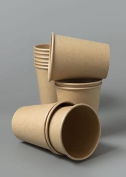 Disposable beige paper cups on a dark gray background closeup, mockup with advertising copy space. Empty cardboard takeaway coffee cups. No plastic and sustainable lifestyle concept