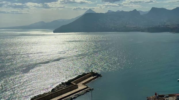 Experience the breathtaking coastline that features sparkling waters, majestic mountains, and an urban landscape