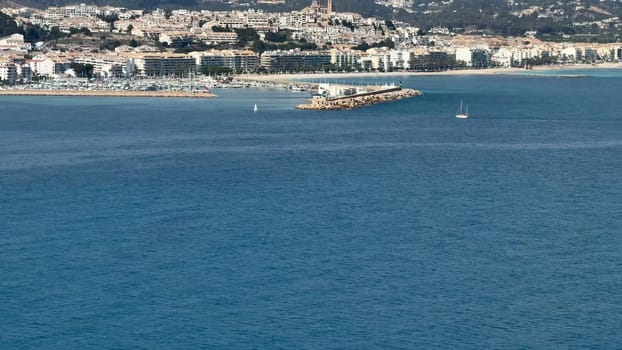 Stunning seaside landscape of Nice, showcasing clear waters, a picturesque promenade, and charming buildings.