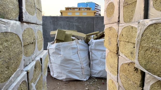 A pleasing view of neatly stacked bales in storage, showcasing important raw materials and supplies
