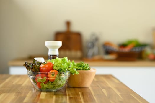 Healthy ingredients for a homemade salad on a kitchen counter.