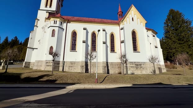 This captivating view of a historic church elegantly showcases its unique and intricate architectural features