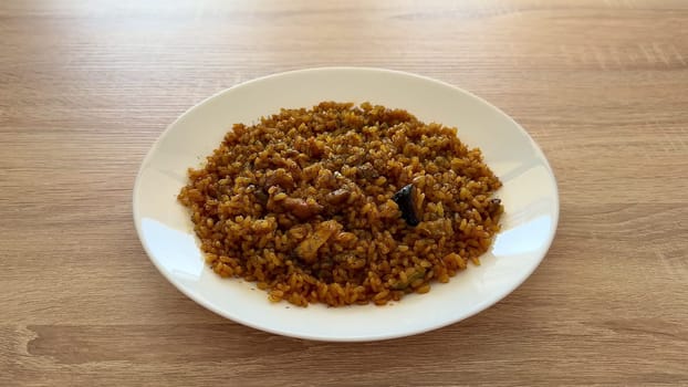 A vibrant plate of Nigerian Jollof rice with chicken, perfect for family gatherings and celebrations.