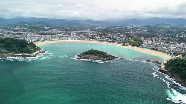 A stunning aerial perspective showcases breathtakingly beautiful islands alongside a vibrant coastal town