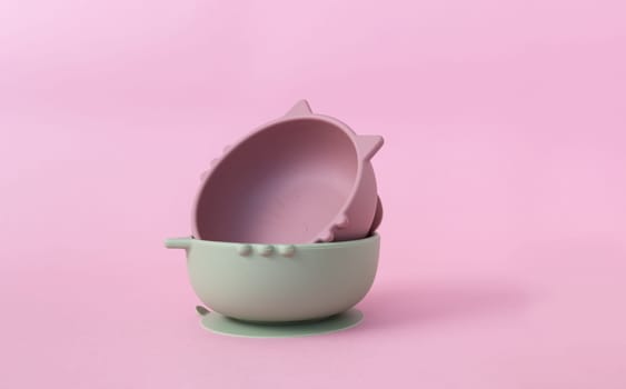 Set of children's bowls. Baby eco silicone tableware. Nutrition and feeding concept. Baby led weaning