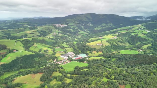Stunning aerial footage beautifully showcasing stunning verdant hills and a serene, picturesque rural landscape