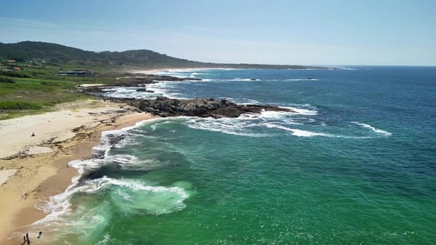 Discover the tranquil beauty and peaceful charm of this serene beach featuring gentle waves and lush vibrant greenery