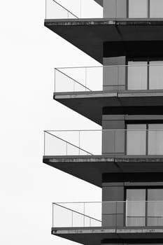 Black and white image of the facade of a residential building in the city center of Swinoujscie in Poland