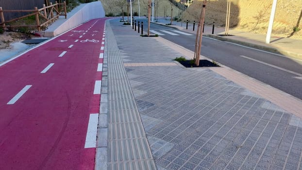Modern bike path and pedestrian walkway in urban development showcasing innovative transport planning.