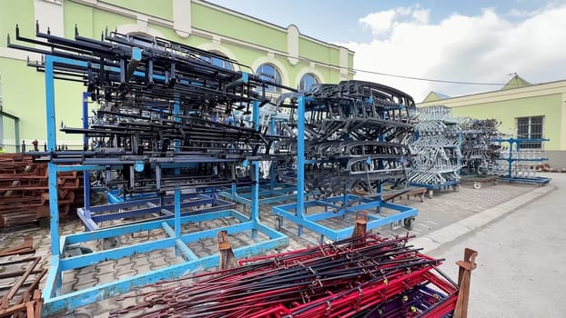 A wellorganized and neatly arranged storage area filled with racks that hold various types of industrial equipment