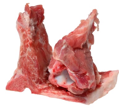 A cut section of raw pork bones with some attached meat and fat, isolated background