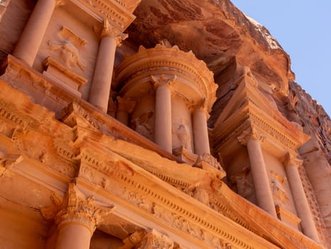 Detail of the carved facade of the Treasury building or Al-Khazneh in the ancient city of Petra