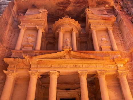 Detail of the carved facade of the Treasury building or Al-Khazneh in the ancient city of Petra