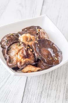 Fragrant shiitake mushrooms fried with thyme and garlic, rich earthy umami aroma