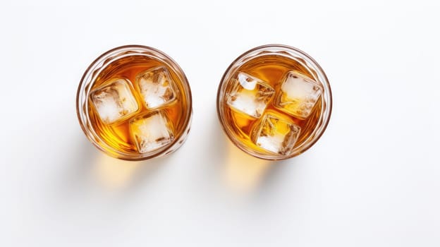Two glasses with cocktails on white background for joyful celebration. Summer vibe.
