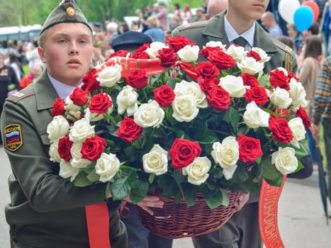 PYATIGORSK, RUSSIA - MAY 09, 2017: Military solders lay flowers to the monument to the fallen soldiers of Second World War