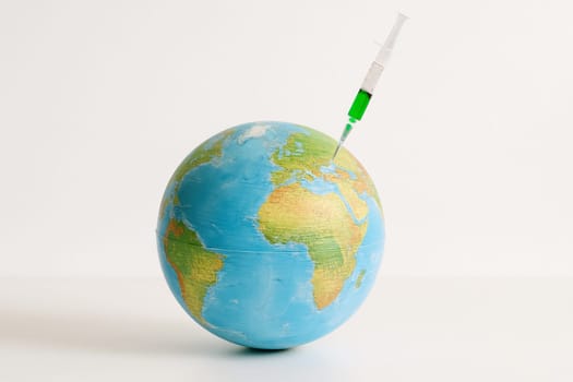 AI generated realistic globe with green liquid syringe symbolizing environmental healing and conservation concept white background climate action earth protection healthcare metaphor