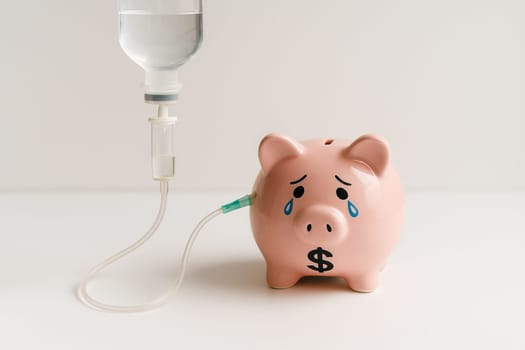 AI generated sad piggy bank with dollar sign receiving iv fluid symbolizing global economic crisis and financial rescue white background money trouble metaphor