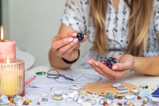 Woman numerologist astrologer counts numbers. Selective focus