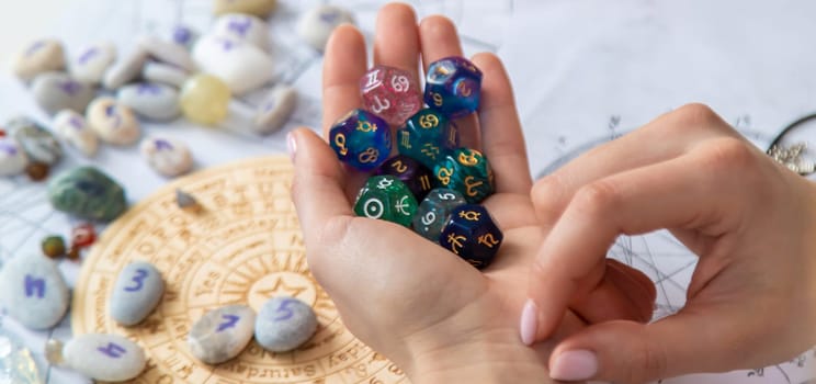 Woman numerologist astrologer counts numbers. Selective focus