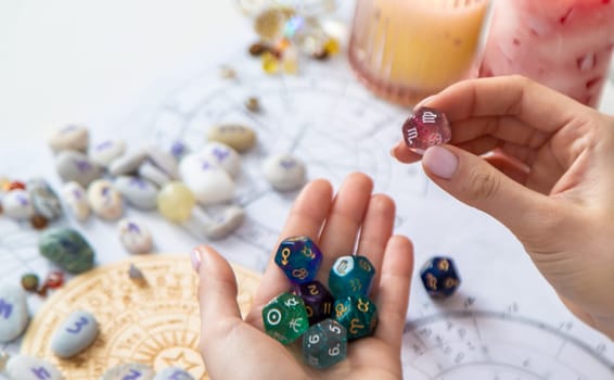 Woman numerologist astrologer counts numbers. Selective focus