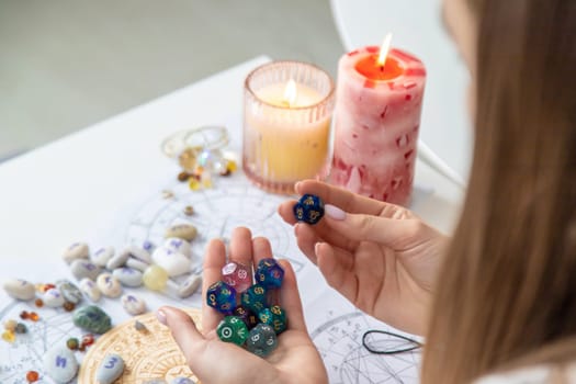 Woman numerologist astrologer counts numbers. Selective focus