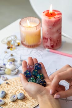 Woman numerologist astrologer counts numbers. Selective focus