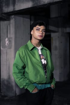an Asian man is standing in an abandoned building in an eccentric outfit at night