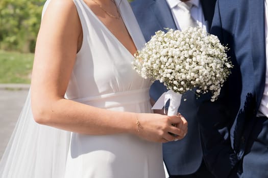 Bridal bouquet and a groom boutonniere of Gypsophila flowers
