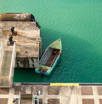 ANTIGUA, WEST INDIES - February 3, 2025: Rowboat at Mooring Platform in Antigua