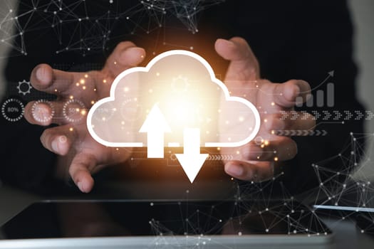 Cloud computing and networking technology concept. A man displays a digital screen with a cloud diagram. A businessman in the background represents global support and innovation.