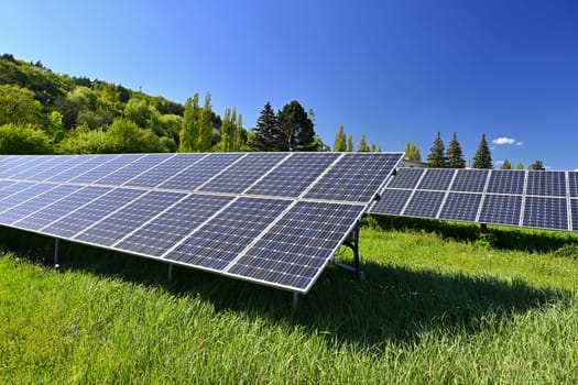 Technology solar cell. Solar panels on the sky background. Power plant. Alternative source of electricity. Solar farm.