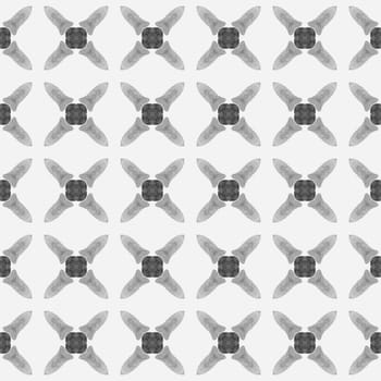 Watercolor ikat repeating tile border. Black and white amusing boho chic summer design. Ikat repeating swimwear design. Textile ready imaginative print, swimwear fabric, wallpaper, wrapping.