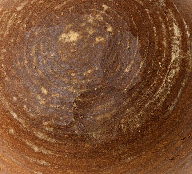 Texture of round rye bread, full frame