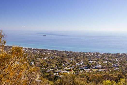 Matthew Flinders Cairn and views at Seawinds Garden as part of the Arthurs Seat State Park on a clear day in autumn in the Mornington Peninsula, Victoria, Australia