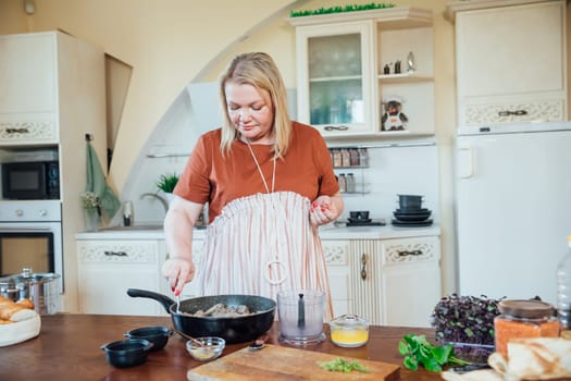 Woman Cook Housewife Cooking In Kitchen Food For Dinner