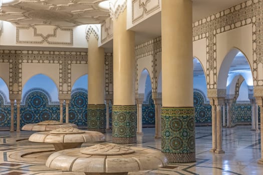 Muslim Ablution, pillars and stone seats at Mosque Hassan II, Casablanca, Morocco. Horizontal.