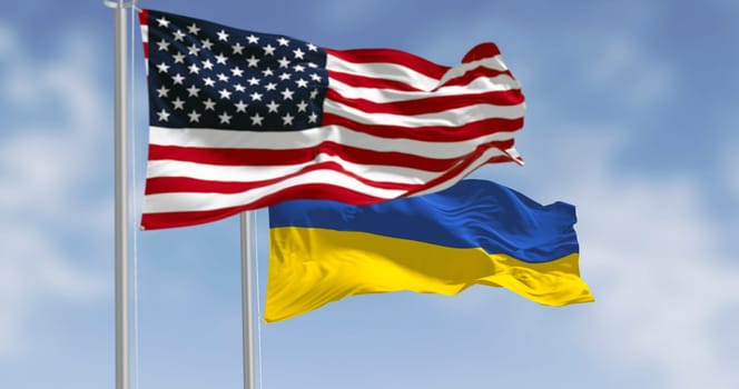 Ukraine and US national flags waving on a clear day. 3d illustration render. Rippling fabric. Selective focus