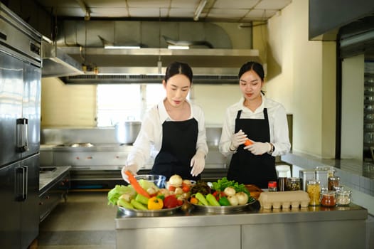 Chef teacher educates culinary students on ingredient selection and recipe techniques.