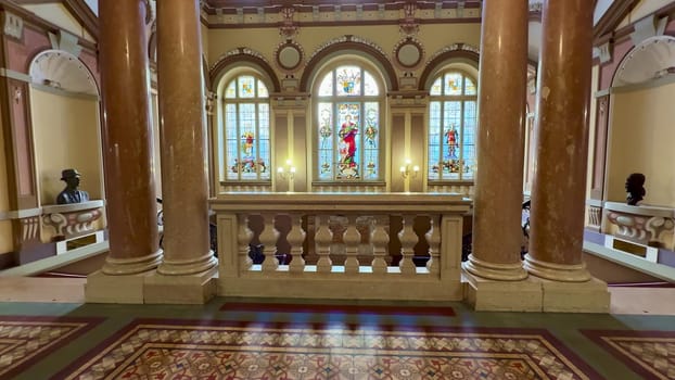 The stunning interior has breathtaking stained glass, grand columns, and intricate motifs showcasing artistry
