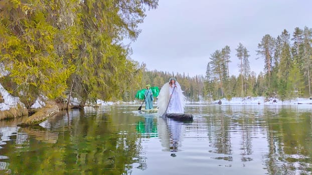 Two girls dressed in white and green stand by the tranquil lake, capturing the magical transition between winter and spring.