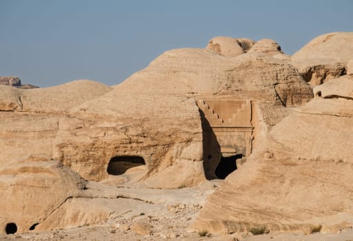 Step Tomb Burial caves in the Necropolis hills on walk from entrance to As Siq in Petra