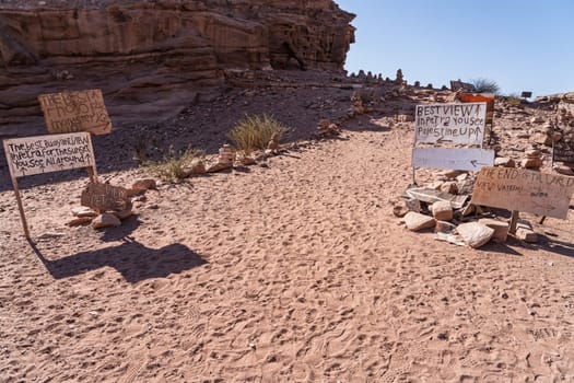 Signs to different views from the top of the trail to the Monastery of rocky mountain range and gorges