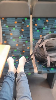 Feet backpack train people travel tourists tourism shotlisttravel women womens walking sitting waiting objects place destination . High quality photo transfer transport