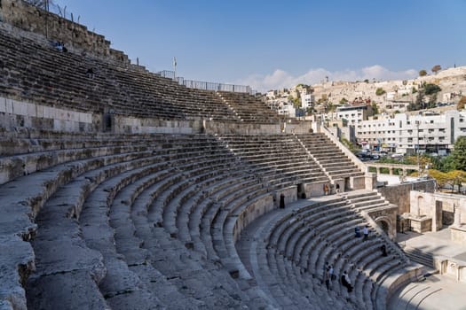Amman, Jordan - 12 November 2024: Roman Theatre of Amman is a 6,000-seat, 2nd-century amphitheater with Amman Citadel opposite
