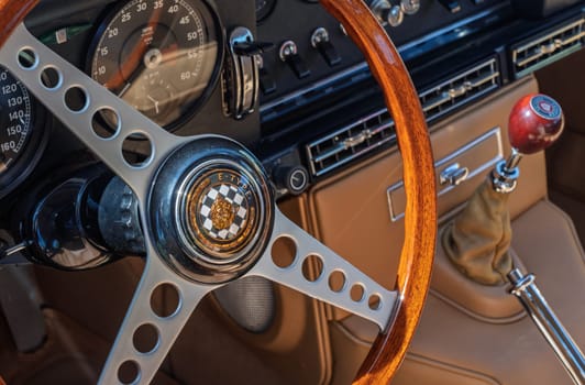Georgetown, TX - 3 May 2025: Interior and steering wheel of a restored E-Type Jaguar 4.2 at a Texas car show