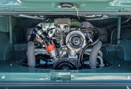 Georgetown, TX - 3 May 2025: Perfect restoration of the 1.7L air-cooled engine of 1972 Volkswagen camper van