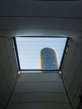 Unusual luxury hotel seen through a sail like shade in the Adbali Mall in the north of the capital city