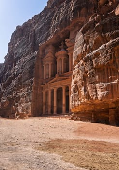 View of the carved facade of the Treasury building or Al-Khazneh in the ancient city of Petra