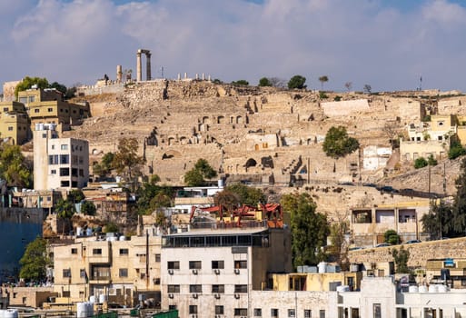 Amman Citadel on the hilltop opposite the Roman Theatre with apartment buildings of the modern city